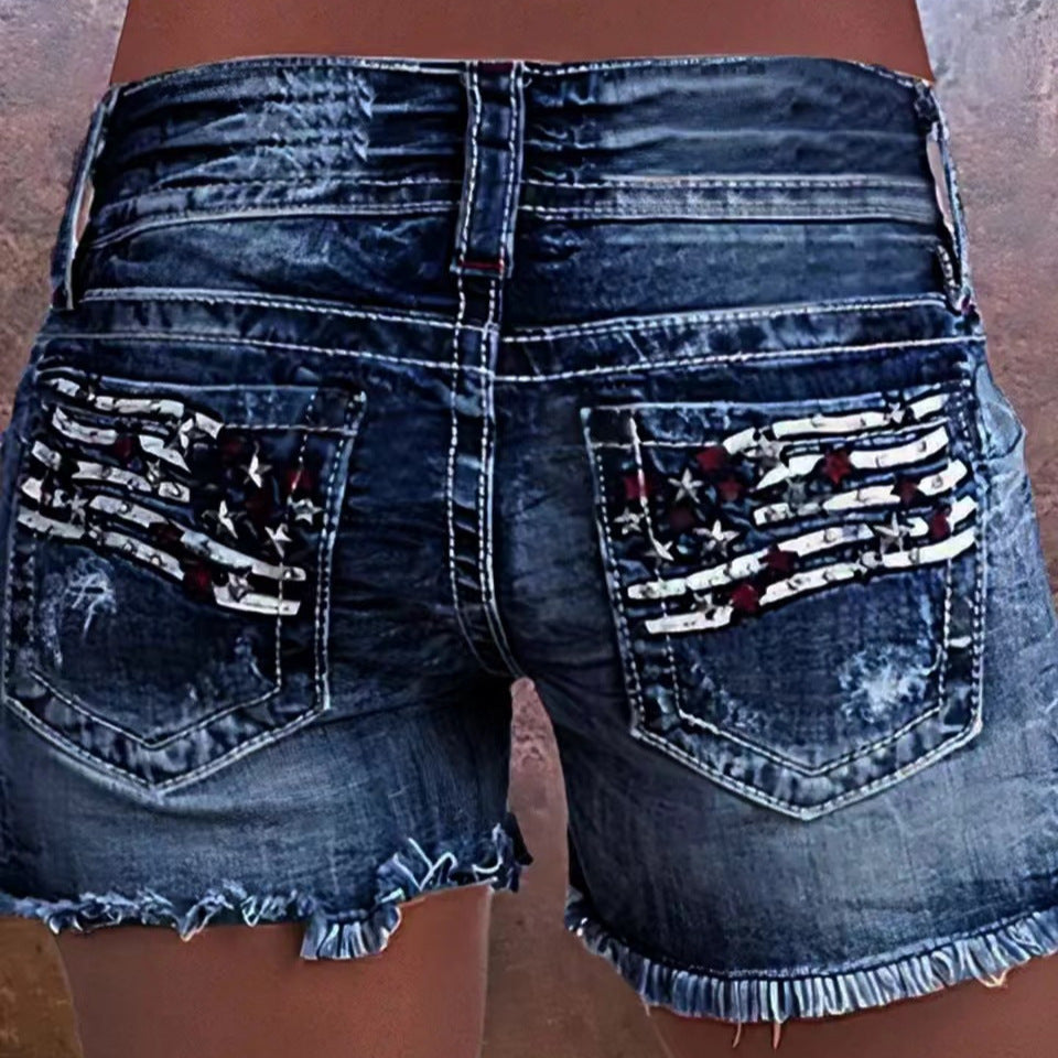Short en jean bleu taille haute slim, poches avec patch étoiles et rayures, ourlet effiloché