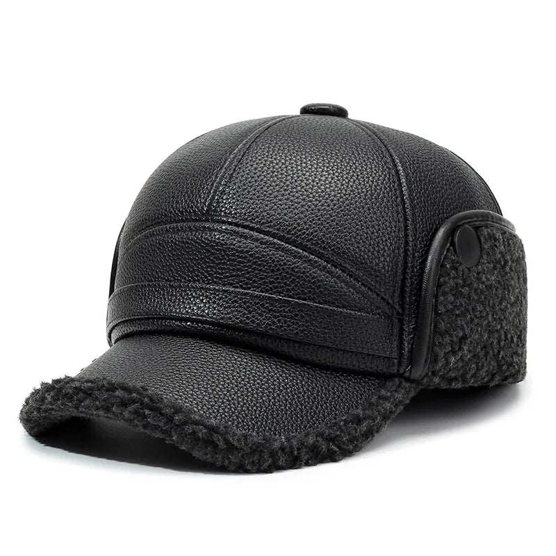 Casquette polaire anthracite avec visière, rabat d’oreille circulaire et bord fourré.