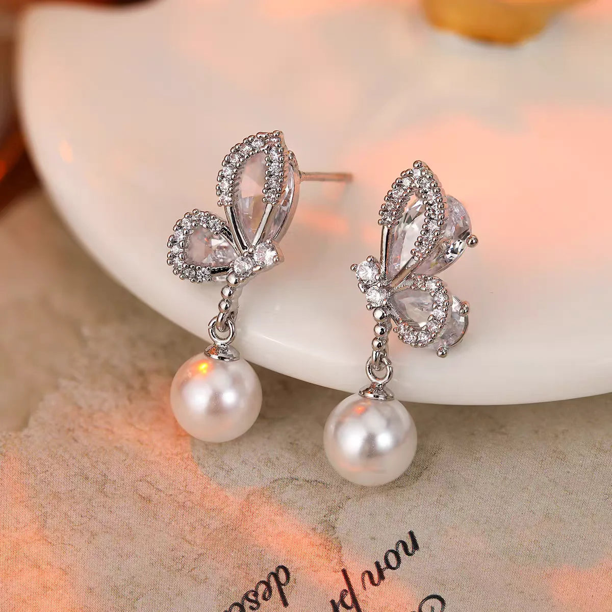 boucles d'oreilles design papillon pour femmes