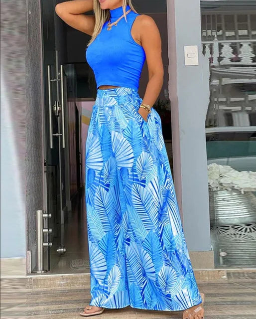 Ensemble pour femme débardeur bleu et pantalon large bleu à motifs feuilles tropicales
