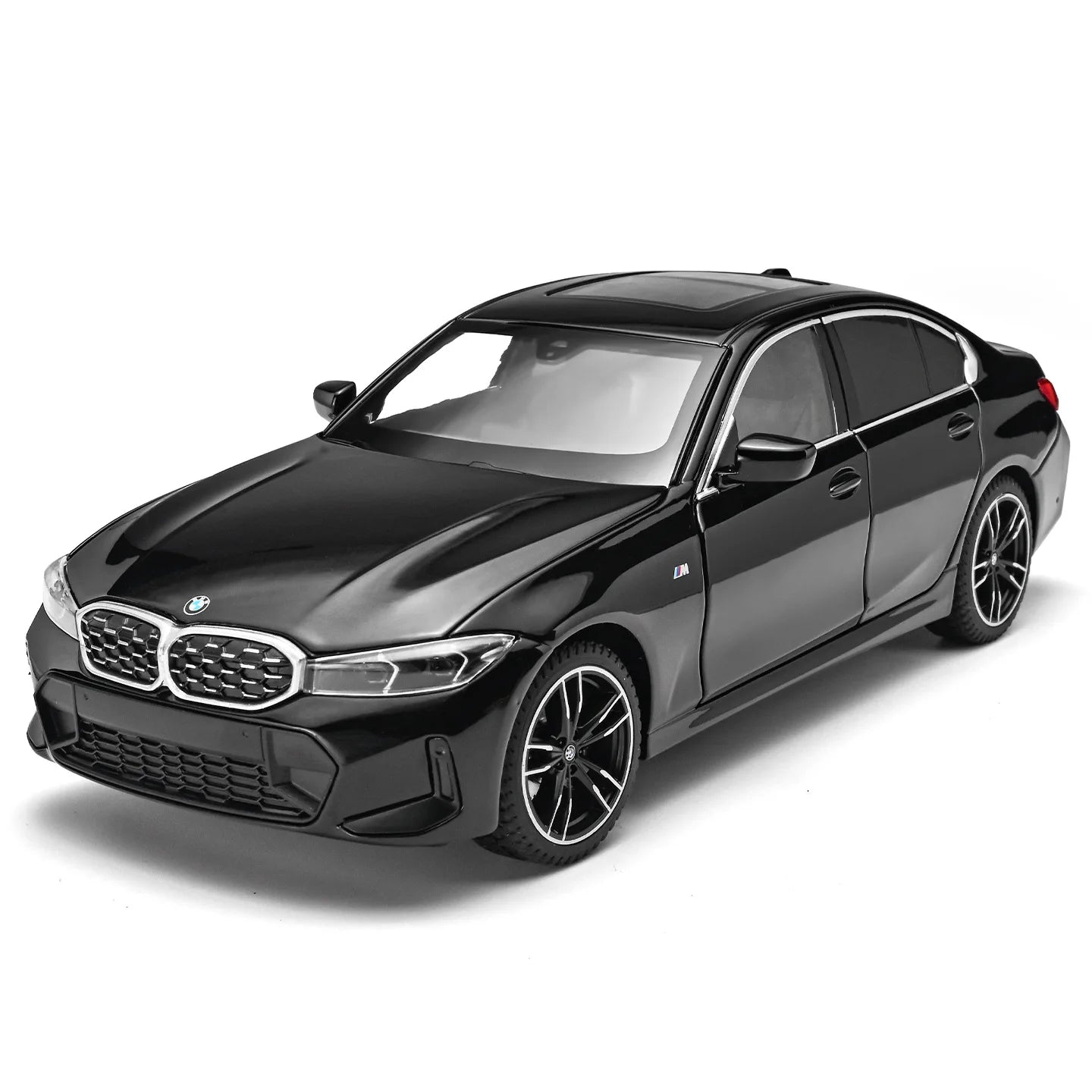 Voiture miniature BMW Série 3 M Coupé noire, vue avant 3/4, jantes et calandre sombres