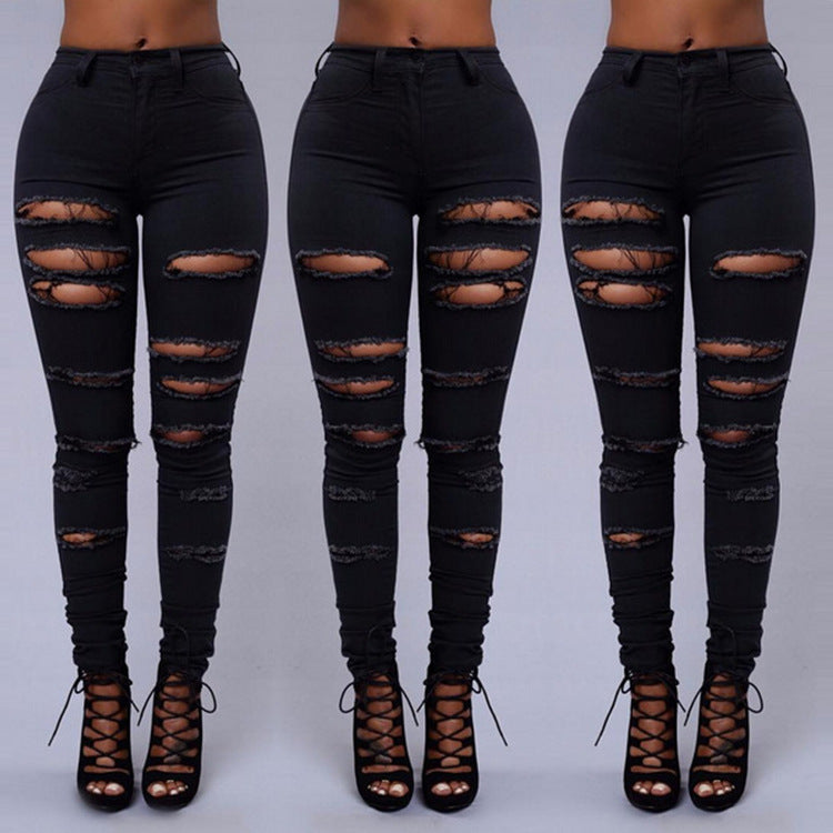 Jean skinny taille haute noir déchiré, ouvertures sur les genoux