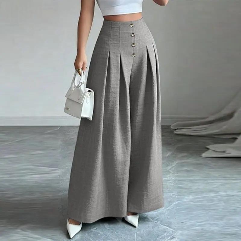 Pantalon femme taille haute ample gris boutonné, plis devant et détails drapés