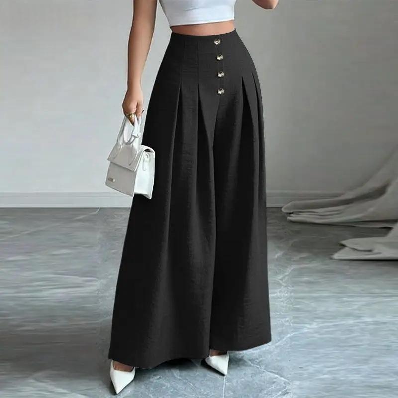 Pantalon ample noir à taille haute, rangée de boutons et plis structurés devant