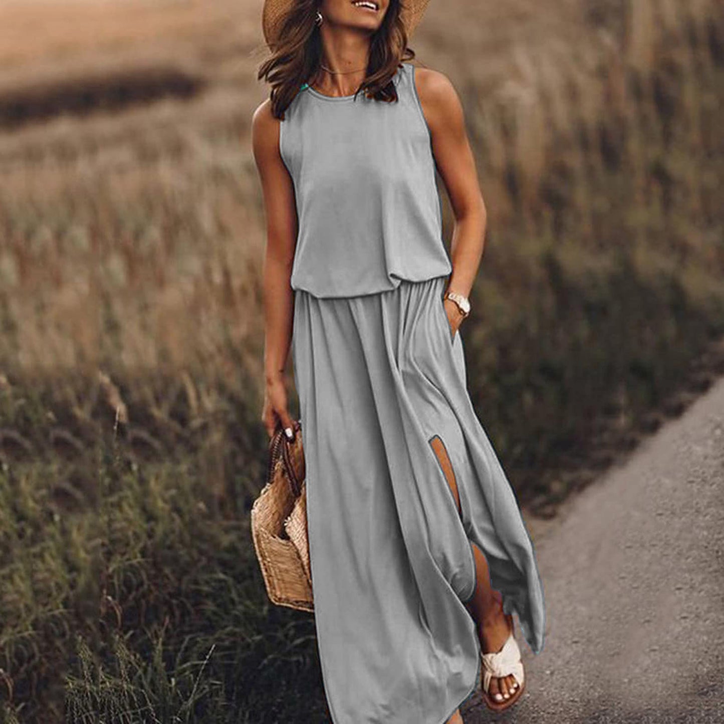 Robe longue sans manches à col rond, gris clair, fente latérale et poches