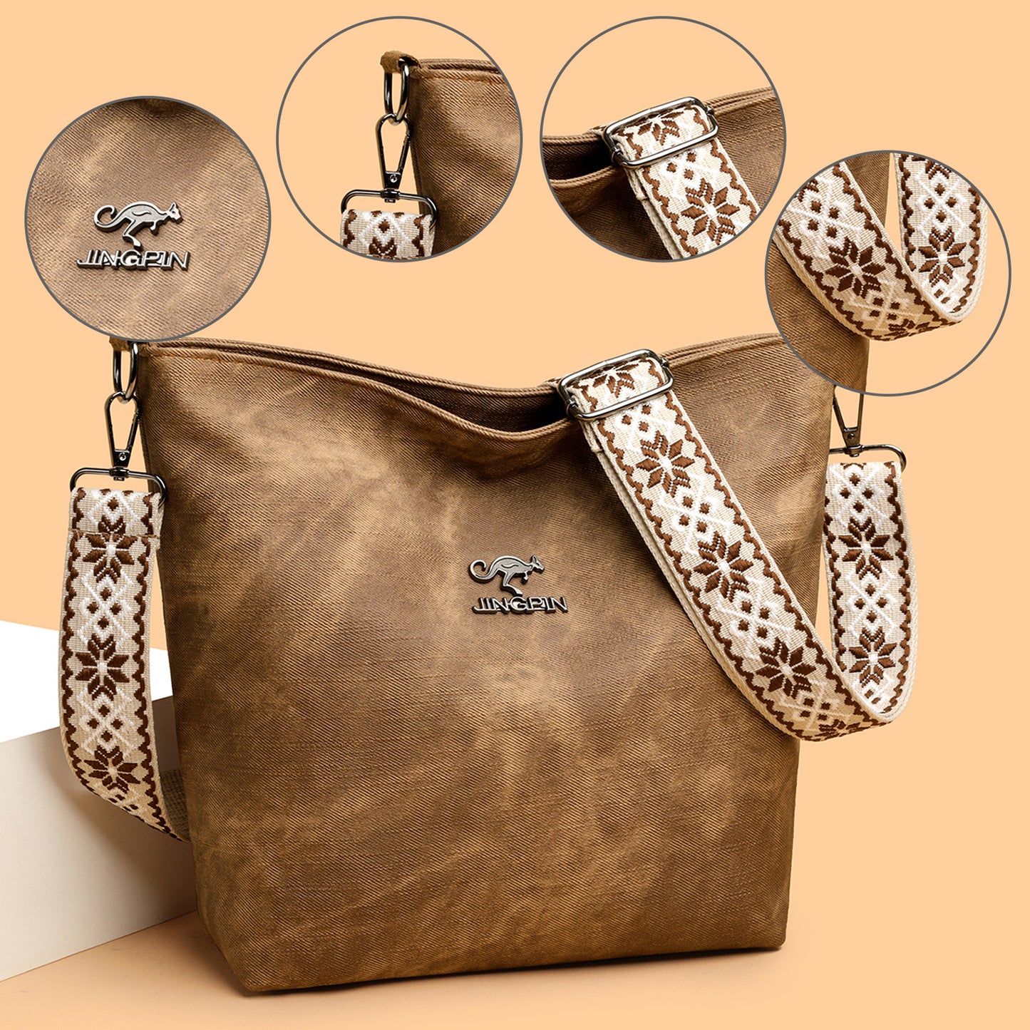 Sac à main souple marron grand format, bandoulière à motifs et logo au centre