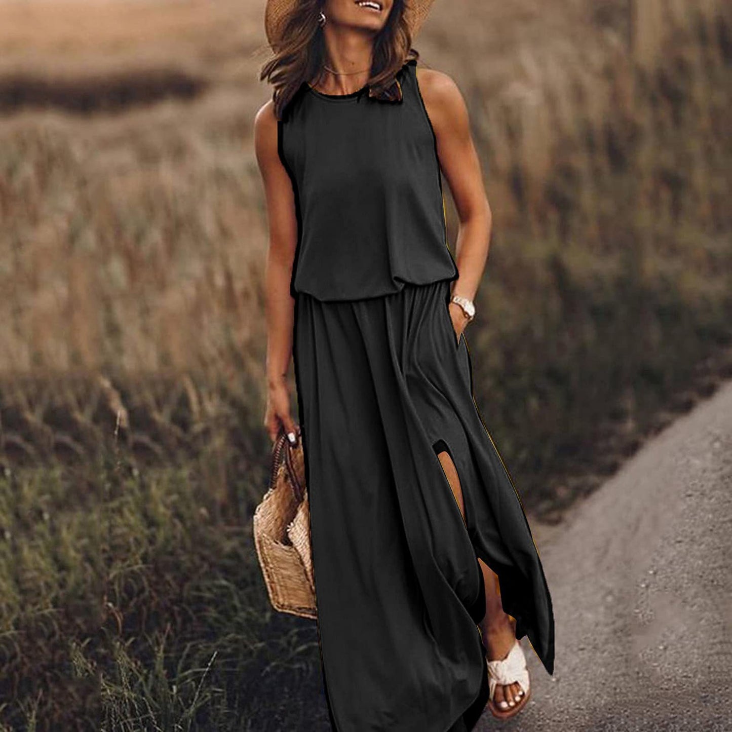 Robe longue sans manches à col rond, noire, fente latérale et poches