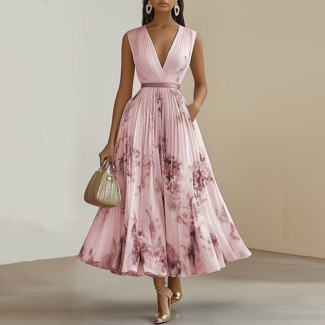 Robe sans manches à taille haute imprimée rose, décolleté en V.