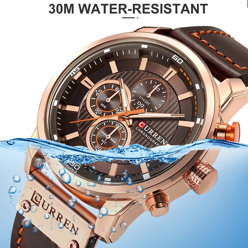 Montre-bracelet CURREN cadran noir, boîtier doré rosé, bracelet cuir marron, chronographe.
