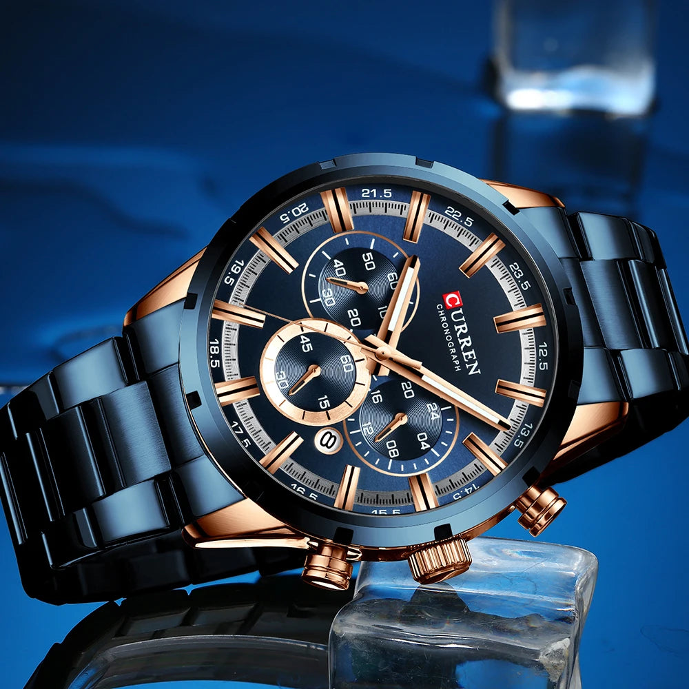 Montre homme CURREN avec bracelet acier bleu foncé et boîtier doré, cadran bleu