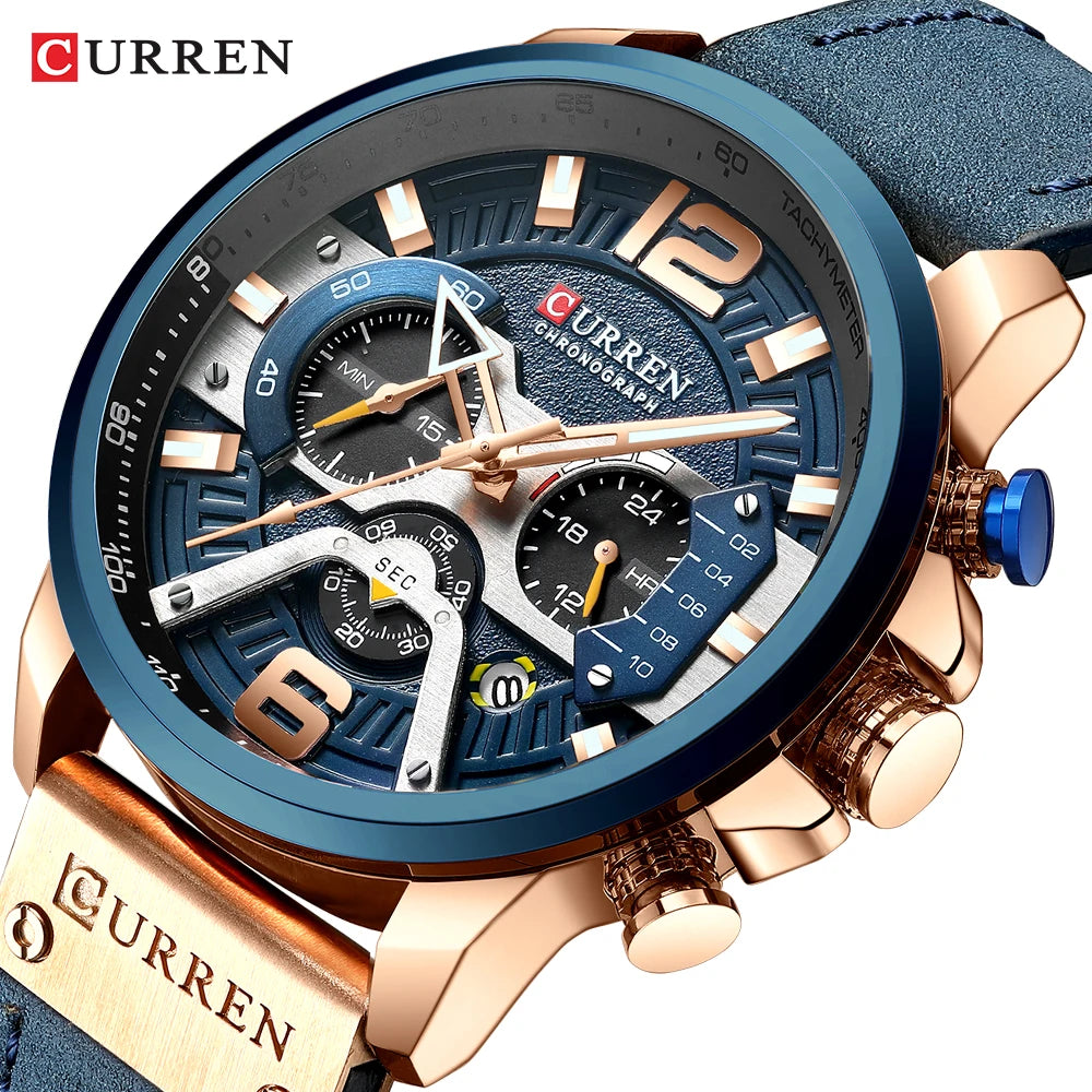 Montre chronographe avec bracelet cuir bleu et boîtier doré, cadran bleu et compteurs ronds