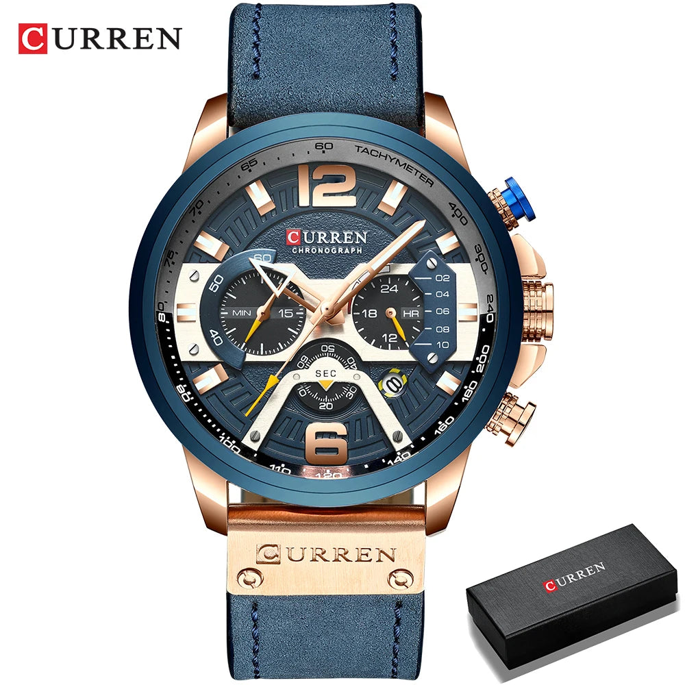 Montre chronographe bracelet cuir bleu, boîtier doré, cadran bleu et lunette tachymètre