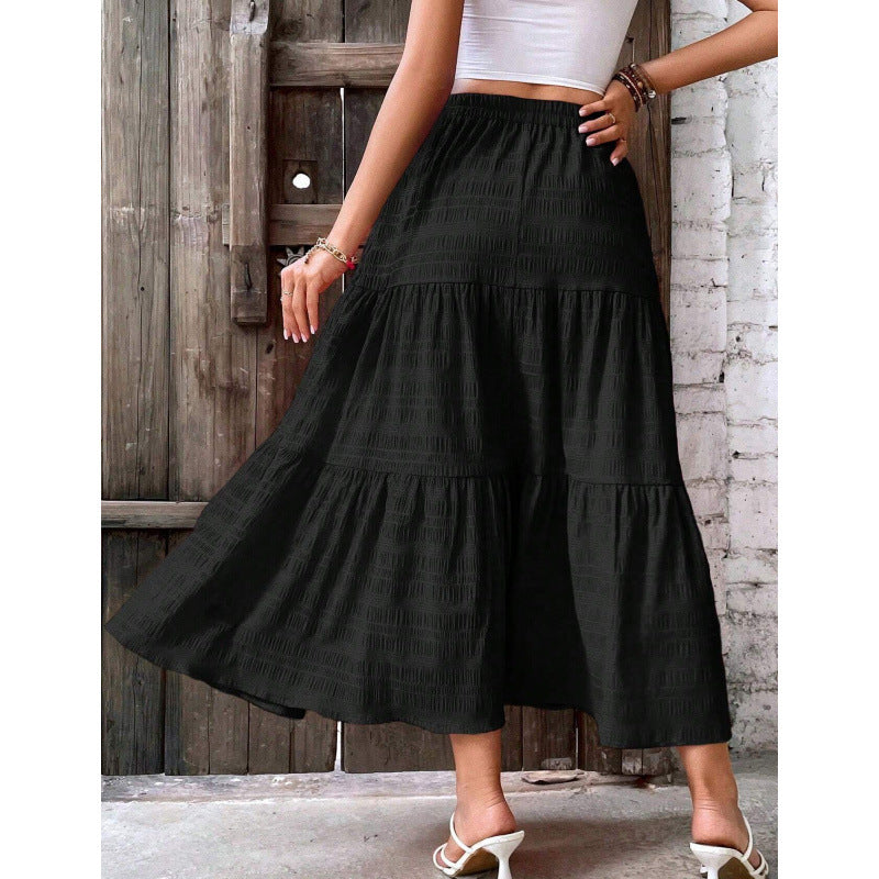 Jupe longue noire à volants, taille élastique, volume ample en étages