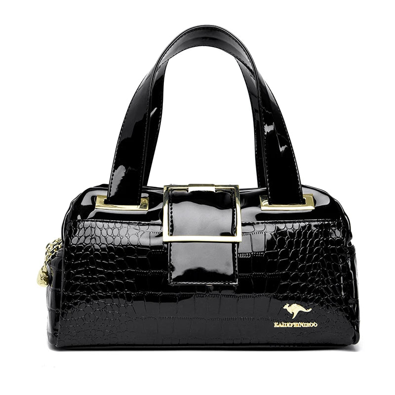 Sac à main en cuir verni effet croco noir, base arrondie et ferrures dorées