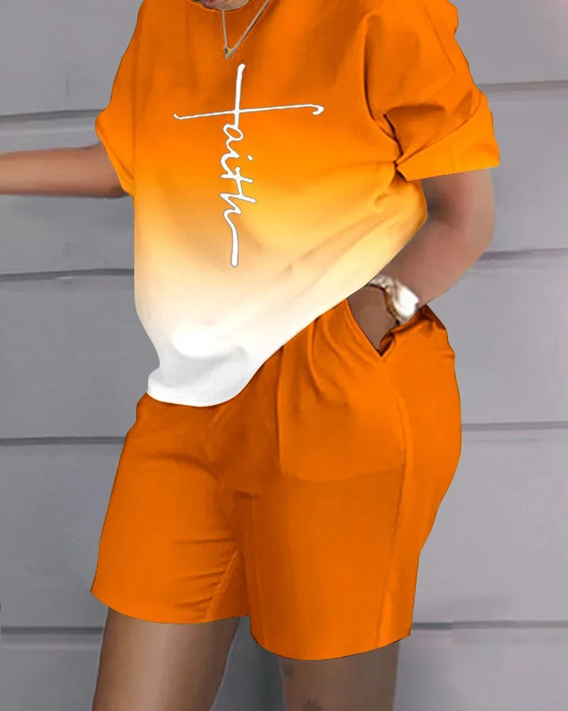 Ensemble deux pièces : t-shirt orange dégradé avec inscription blanche et short orange uni