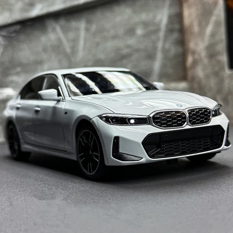Voiture miniature BMW Série 3 M Coupé blanche, vue avant, calandre et phares détaillés