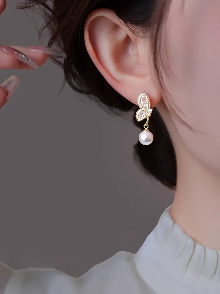 boucles d'oreilles design papillon pour femmes