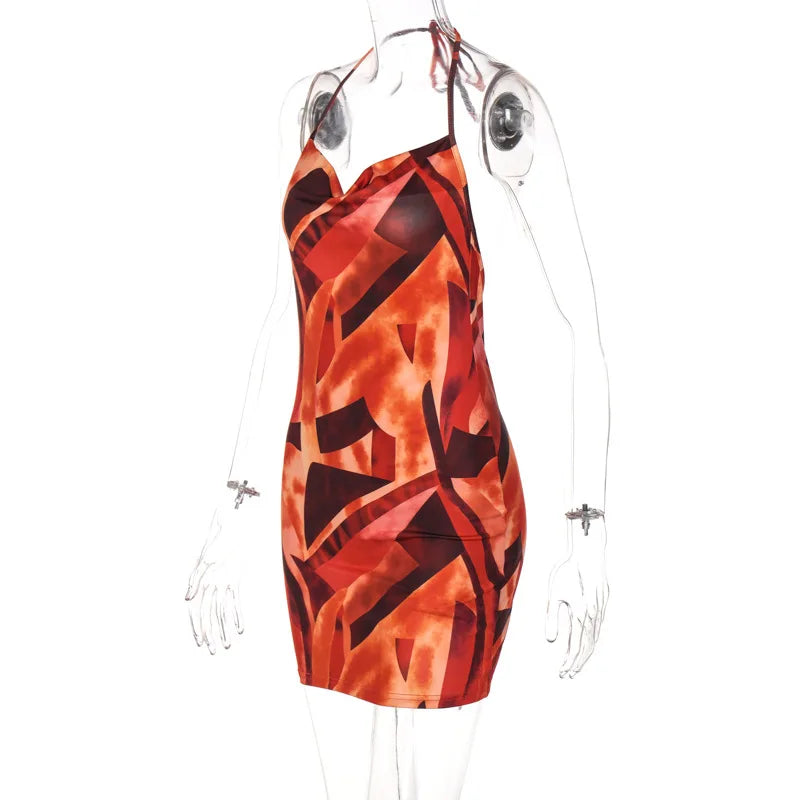 Robe moulante dos nu, bretelles nouées, orange à motifs graphiques