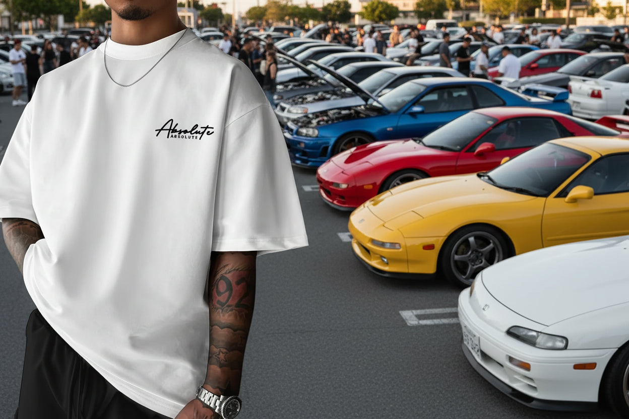 T-shirt blanc col rond à logo «Absolute» sur la poitrine.