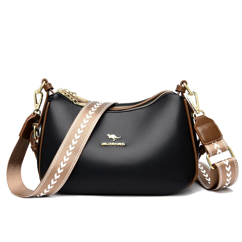 Sac bandoulière en cuir noir, bandoulière beige à motif blanc et zippée