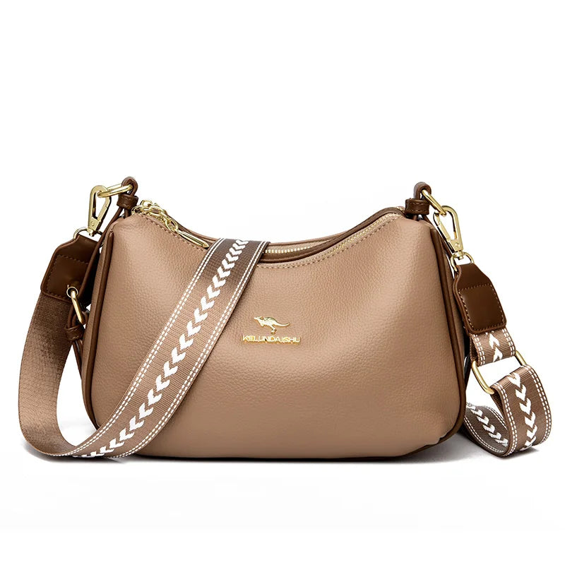Sac à main en cuir beige avec bandoulière tressée et poche zippée, fermoir métal