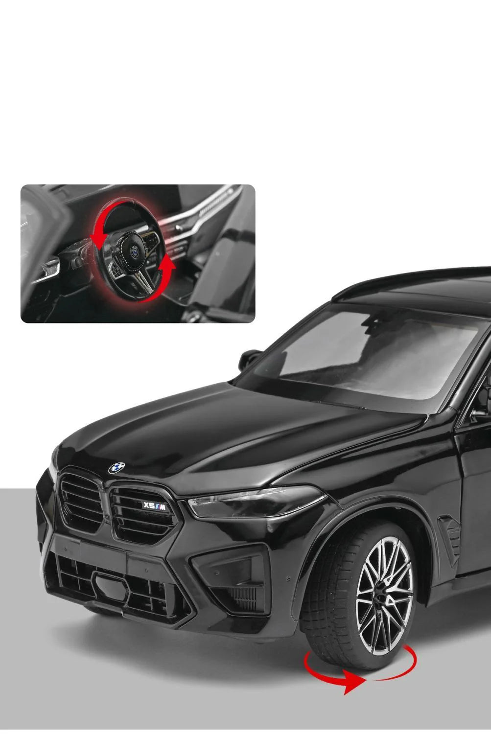 Voiture miniature BMW X5M noire, vue avant 3/4, roue avant et volant
