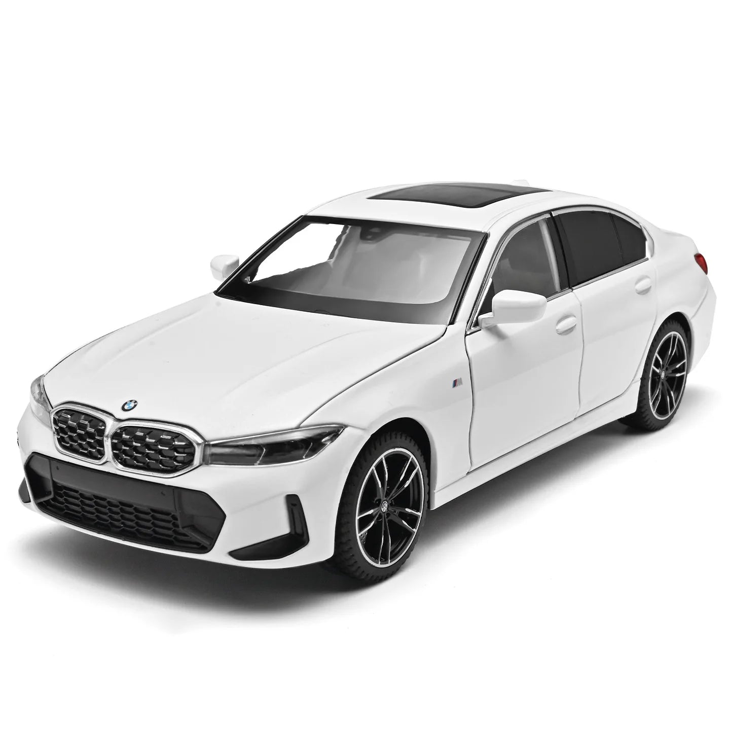 Voiture miniature BMW Série 3 M Coupé blanche, vue avant 3/4, jantes à rayons
