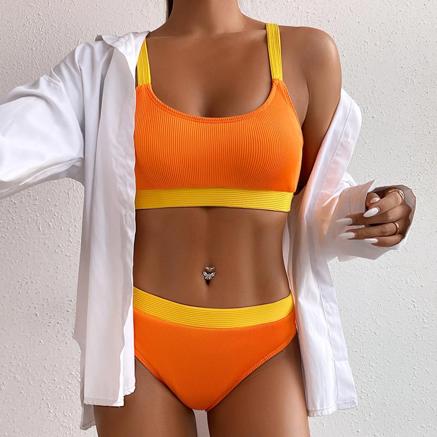 Ensemble maillot de bain rayé orange et jaune, brassière et slip taille haute