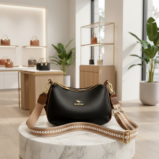 Sac bandoulière en cuir noir à fermeture zippée et bandoulière tressée beige