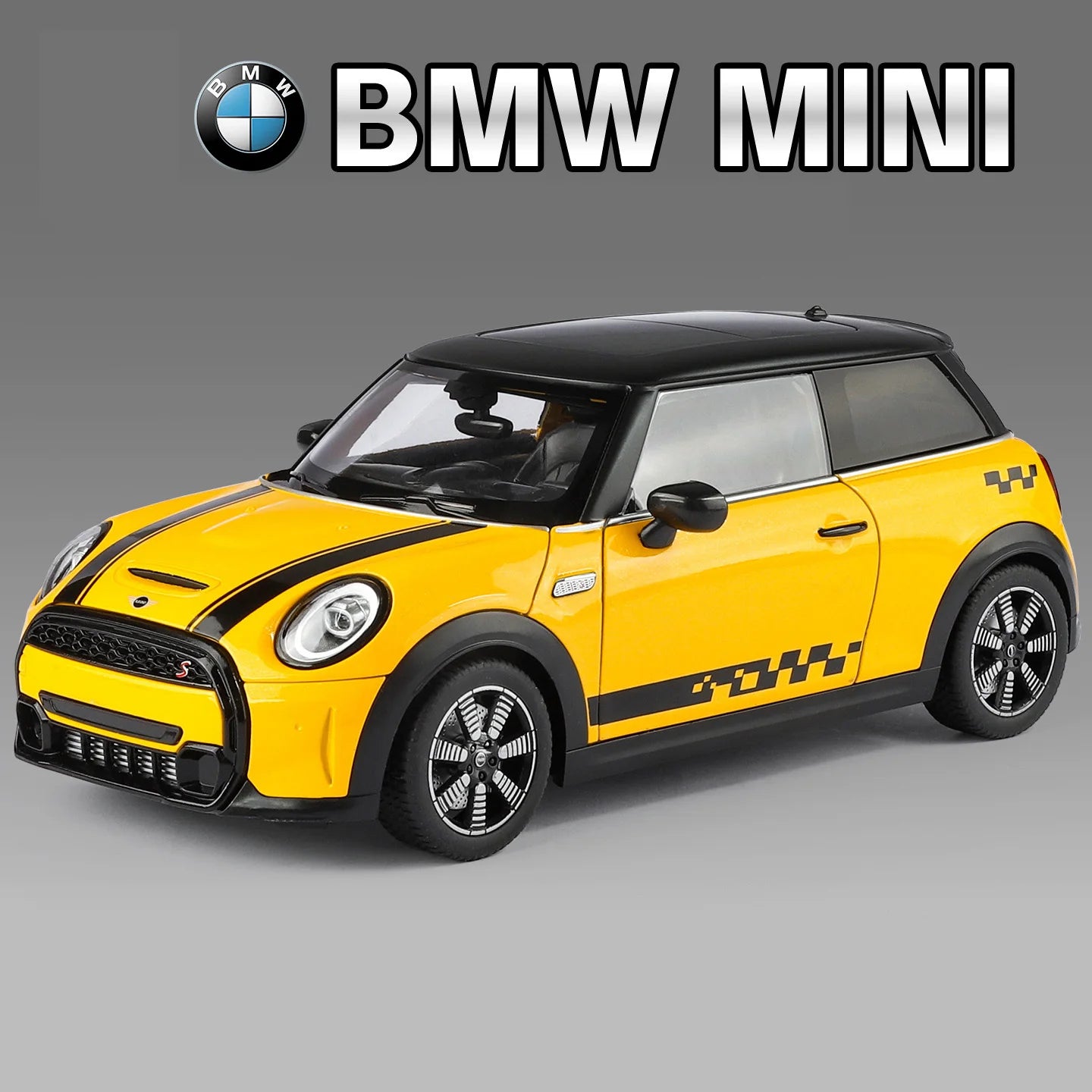 Mini Countryman S 1:18 jaune, vue avant trois-quarts avec bandes graphiques sur flanc