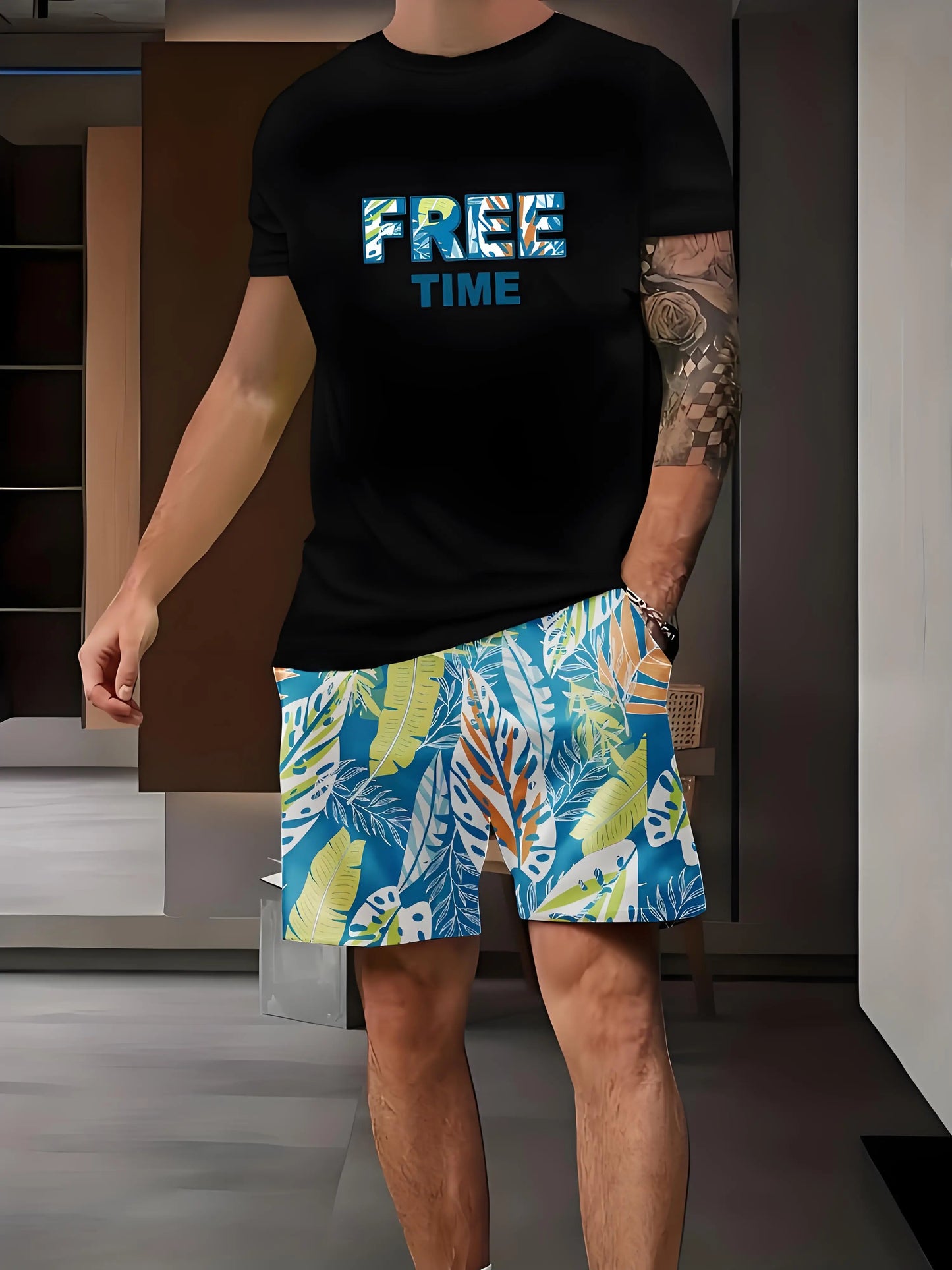 Ensemble t-shirt à col rond noir, imprimé couleur sur le devant, short à motifs feuillage