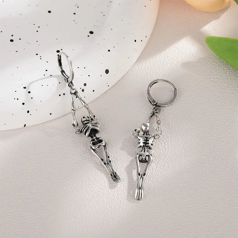 Boucles d'oreilles squelette argenté idéal pour halloween