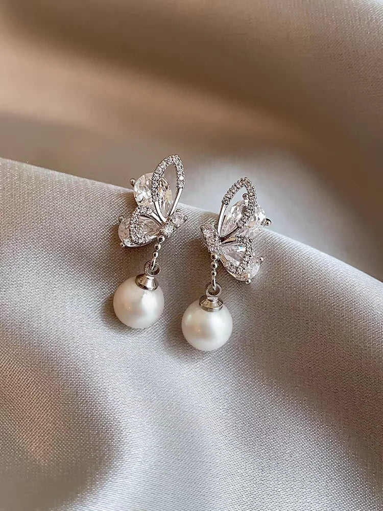 boucles d'oreilles design papillon pour femmes