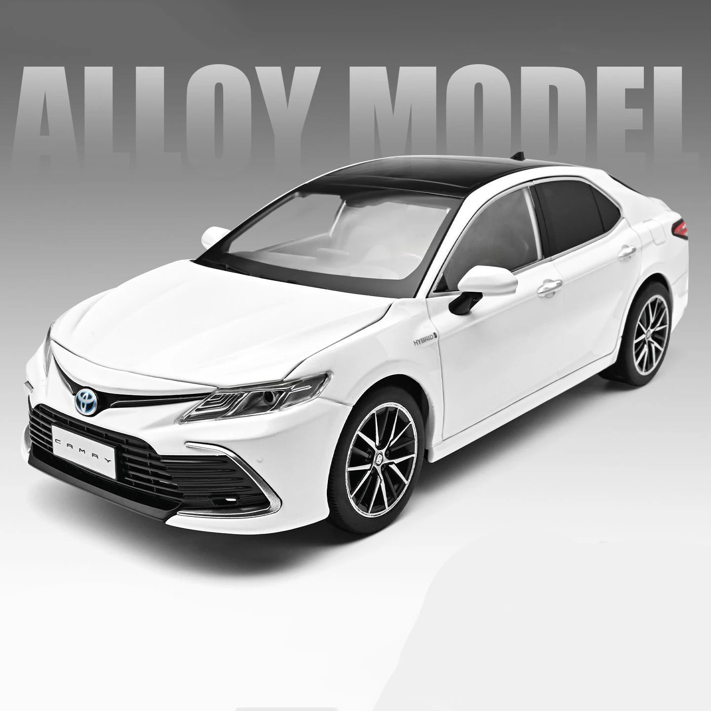 Voiture miniature Toyota Camry 1:18 blanche, vue avant 3/4, roues et optiques