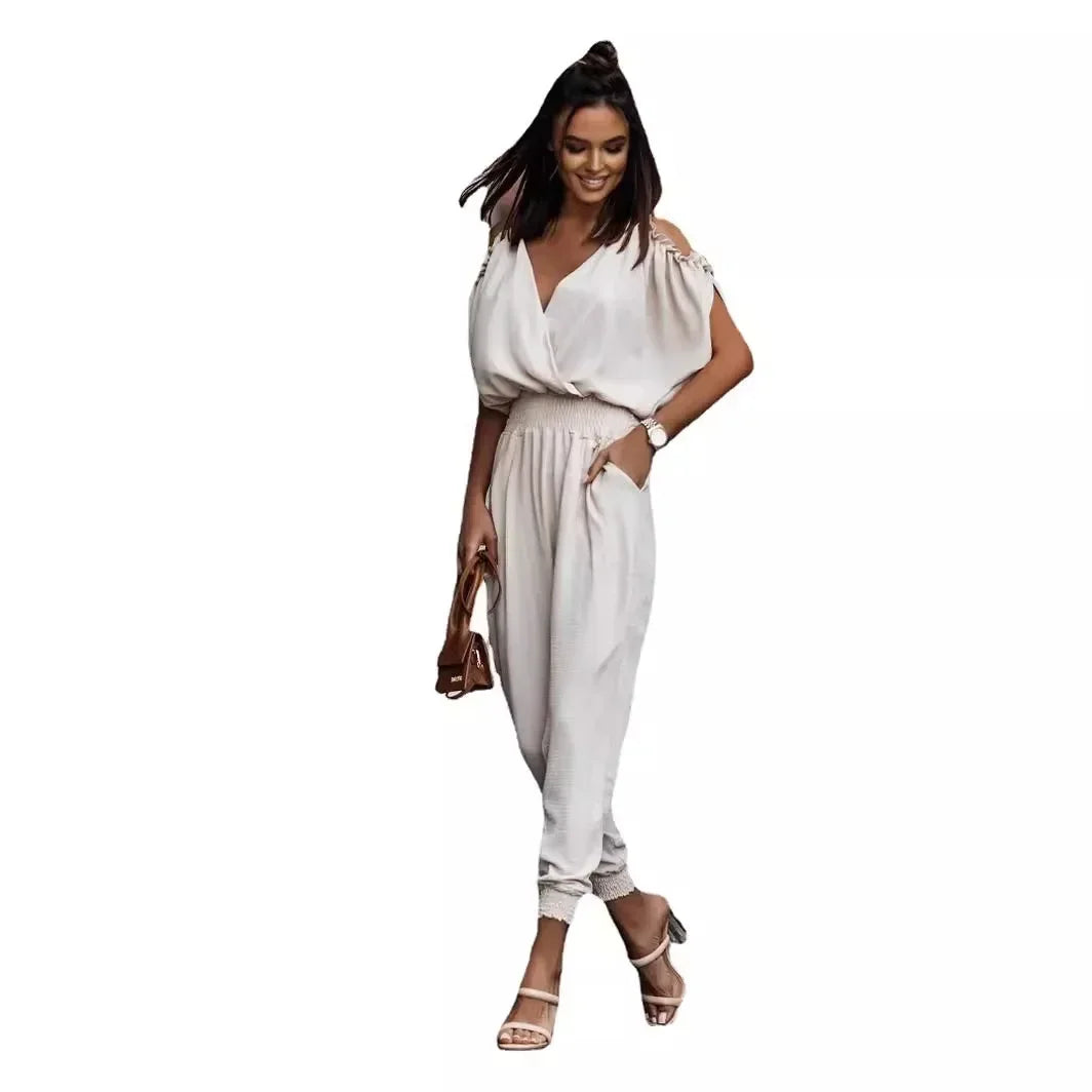 Combinaison blanche à col V, manches bouffantes, taille élastique et jambes amples