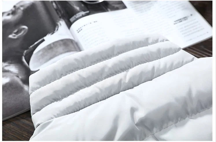Détail du matelassage du gilet sans manches gris clair