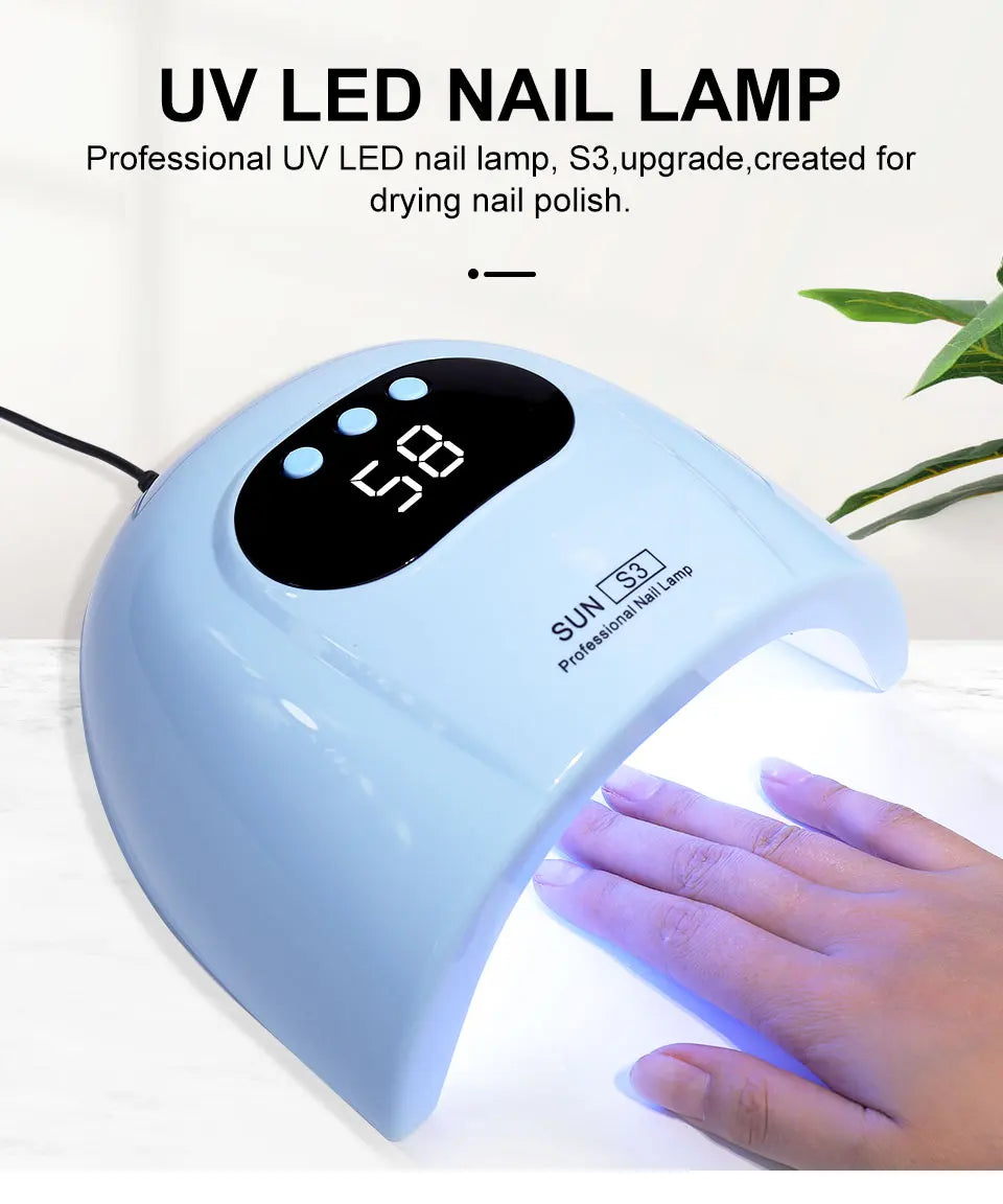 Lampe UV LED bleue pour ongles, écran digital S3 noir et mains sous la lumière.