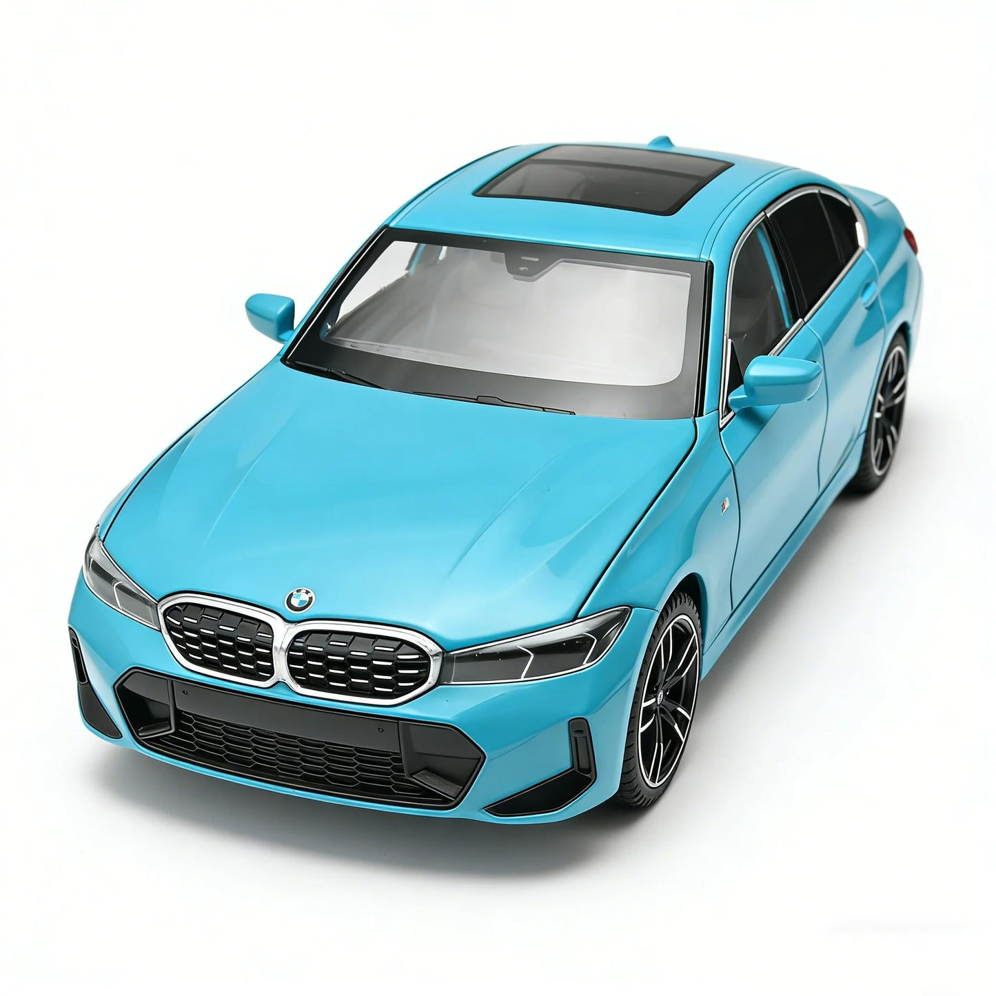 Voiture miniature BMW Série 3 M Coupé bleue, vue avant rapprochée, calandre et phares noirs