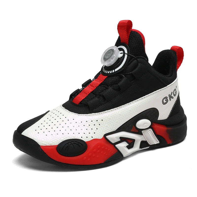 Chaussure de basket enfant noire et blanche à touches rouges, détail de la semelle