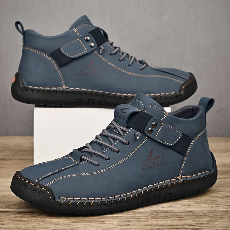 Chaussures décontractées homme en cuir bleu marine, lacets, bride et semelle épaisse.
