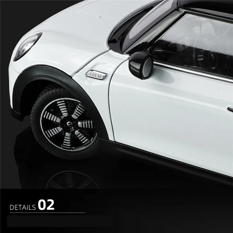 Mini Countryman S 1:18 blanc, roue avant et aile avec grille latérale