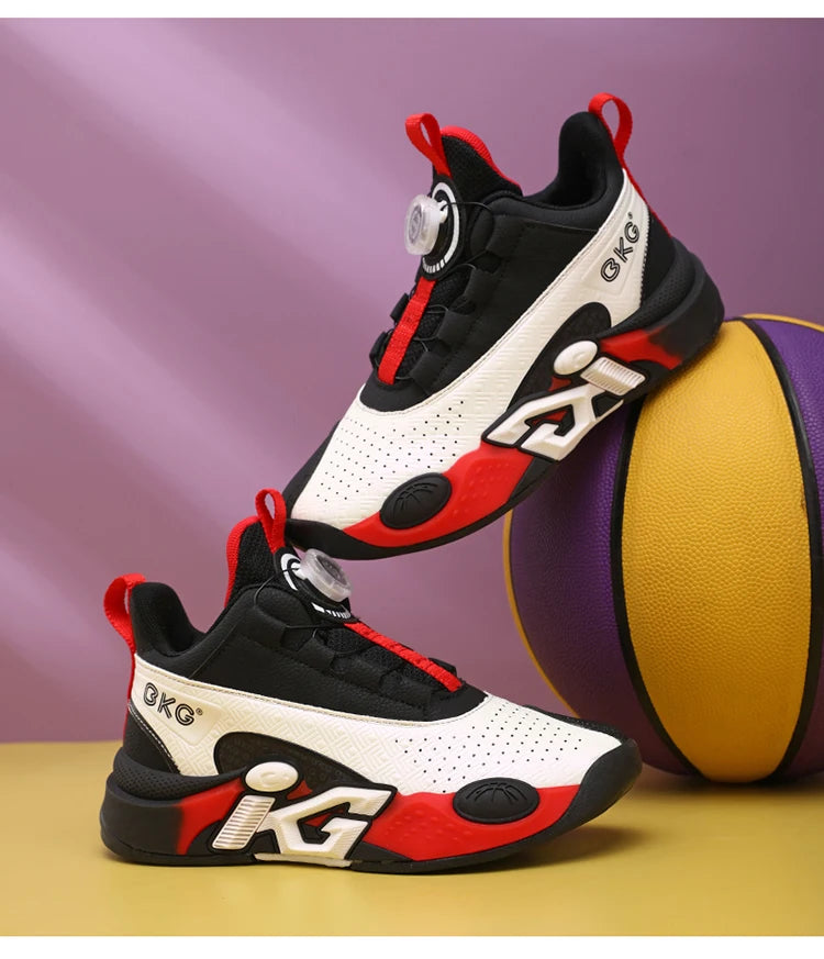 Chaussure de basket enfant blanche et noire à accents rouges, lacets et sangle