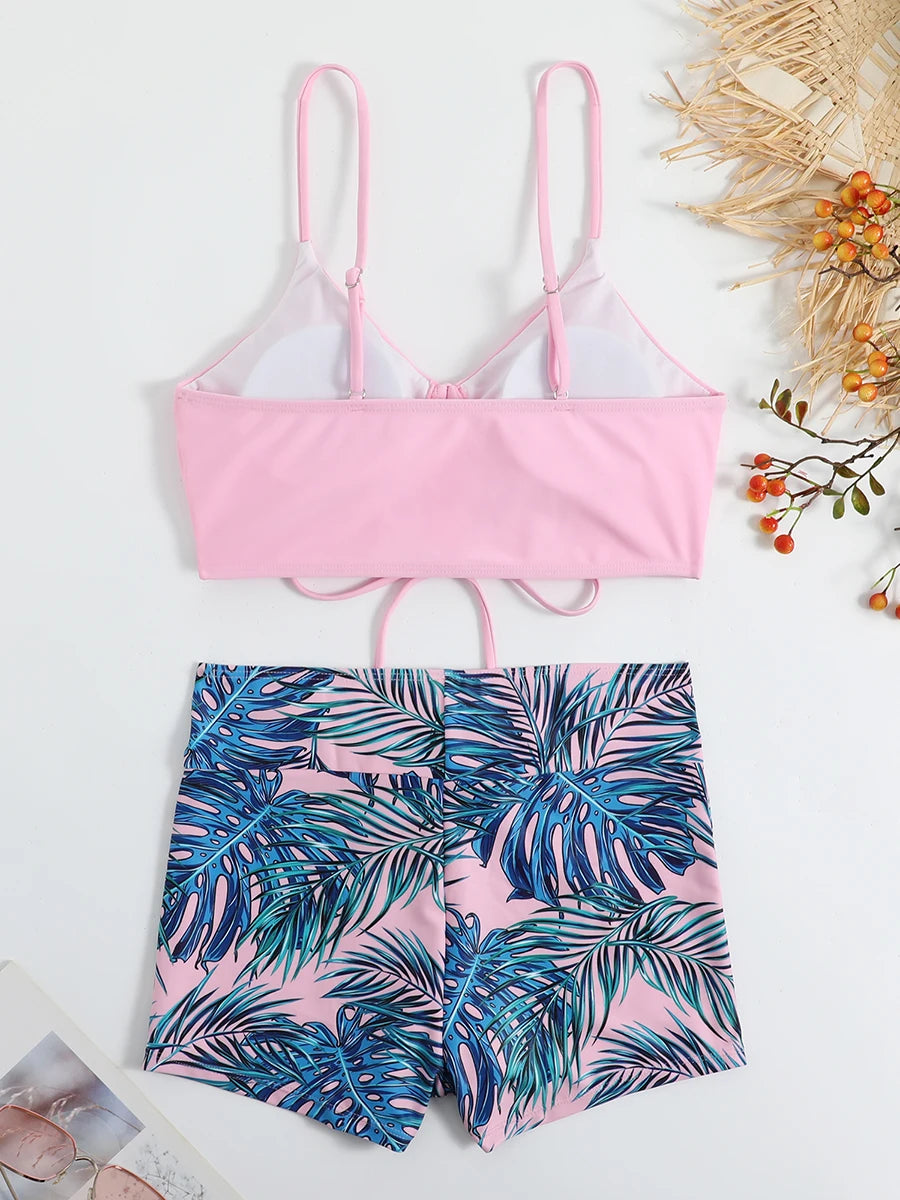Bikini deux pièces rose: haut à bretelles noué et shorty imprimé feuilles vertes