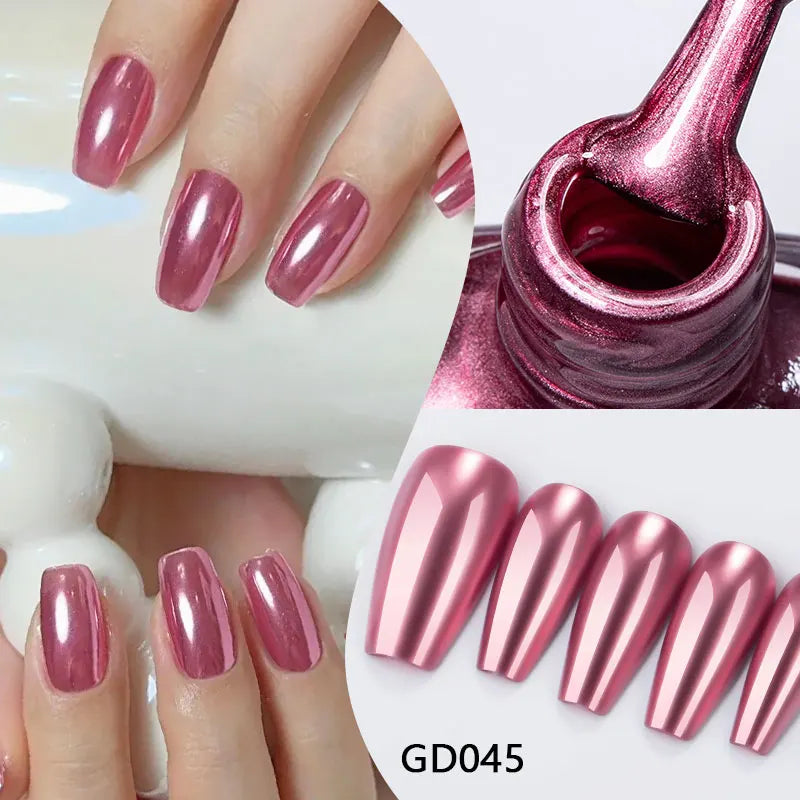 Vernis à ongles effet miroir rose, flacon et ongles métallisés.