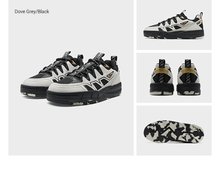Chaussures de skate gris, noir et blanc, profil latéral et semelle texturée