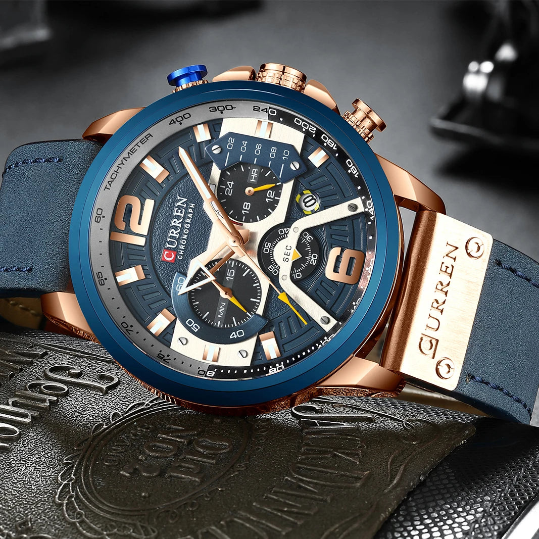 Montre chronographe bracelet cuir bleu, boîtier doré rosé, cadran bleu avec compteurs