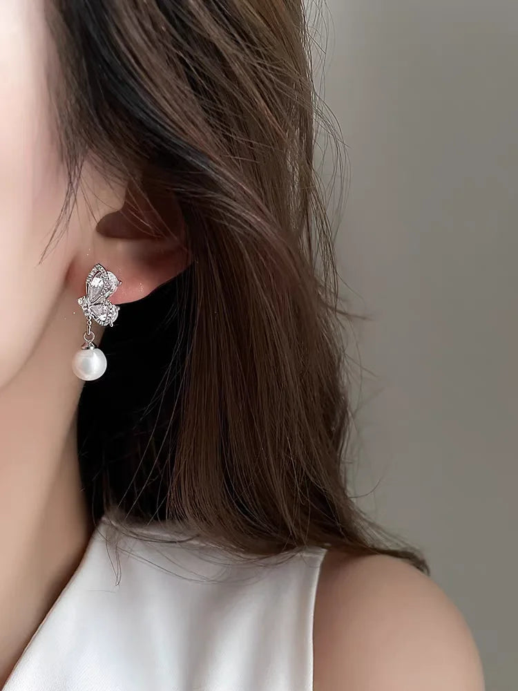 boucles d'oreilles design papillon pour femmes