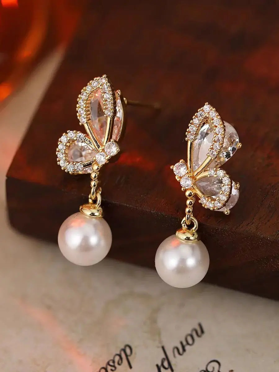 boucles d'oreilles design papillon pour femmes