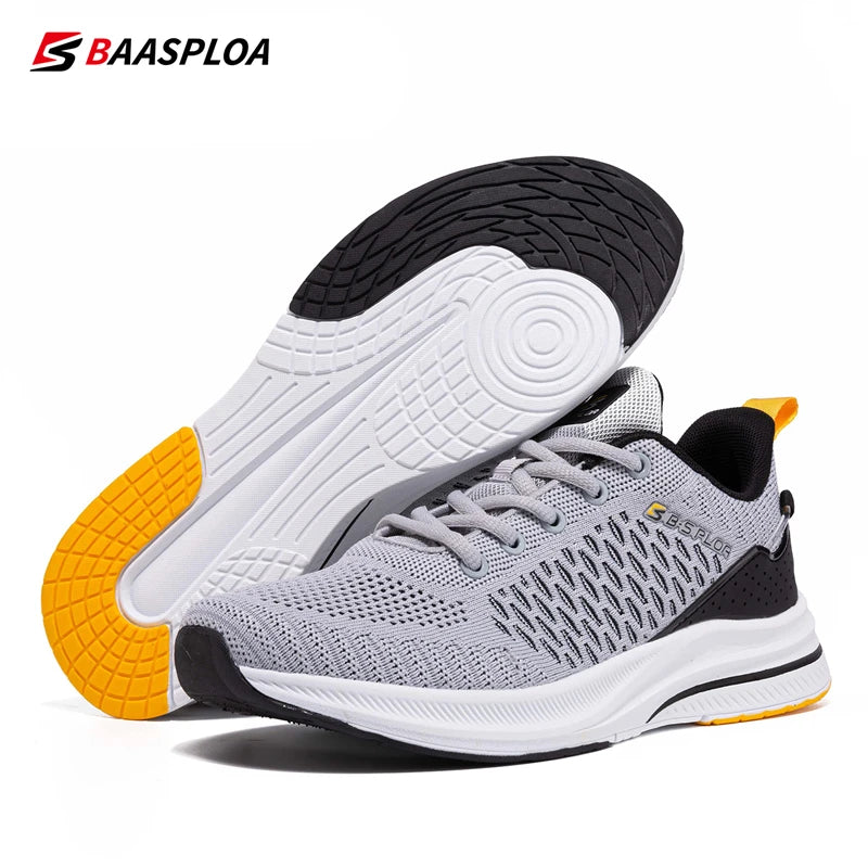 Chaussures de running homme en maille grise, semelle noire avec inserts jaunes.