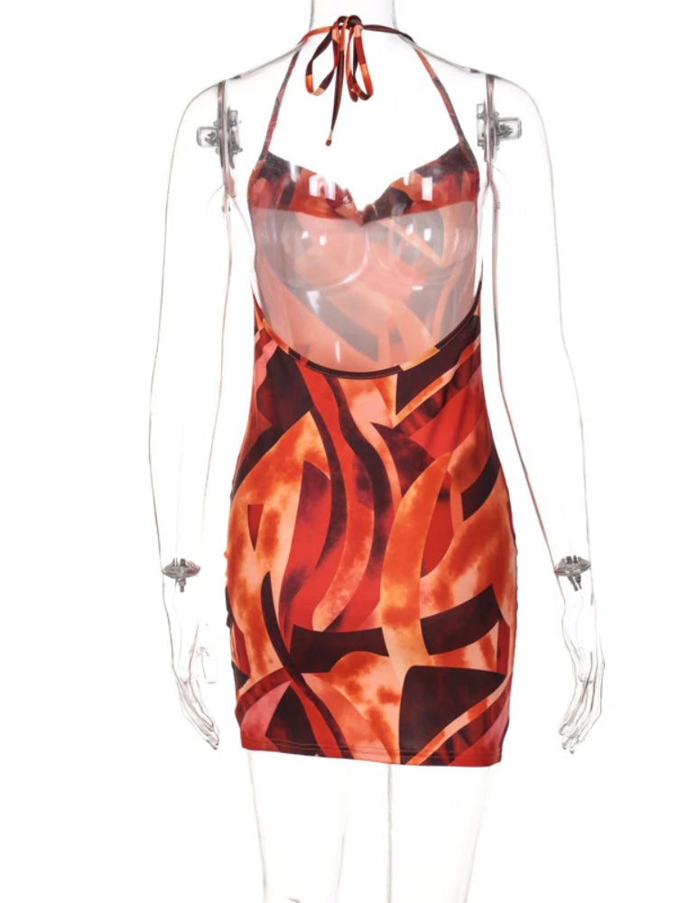 Robe moulante dos nu, bretelles nouées, orange à motifs graphiques